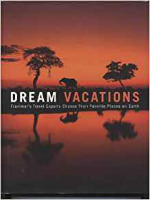 The cover of "Dream Vacations," a Frommers coffee table book. It shows an African landscape silhouetted against a red sunset sky and reflected in a lake